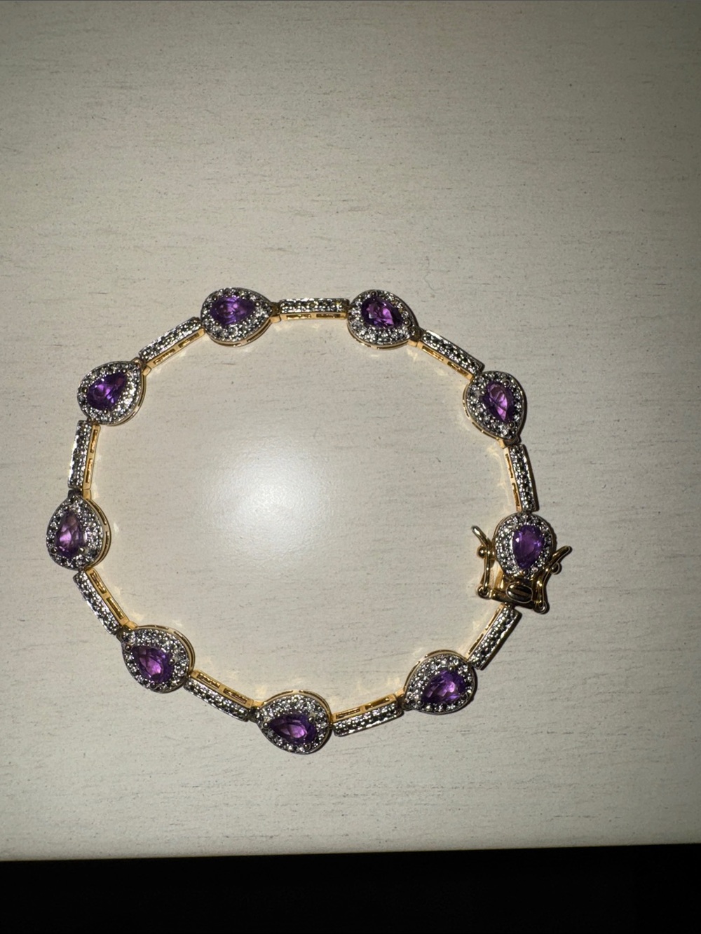 Gold Bracelet with Purple Teardrop Stones and Pavé Detail